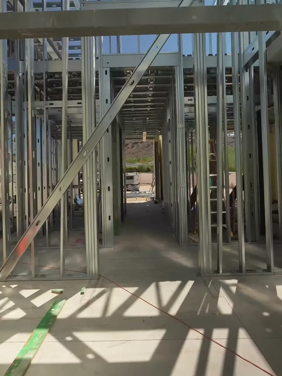 Stud framing standing on the slab of the Paradise Valley estate