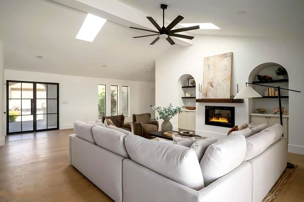 Statement fireplace surround in a Gainey Ranch living room