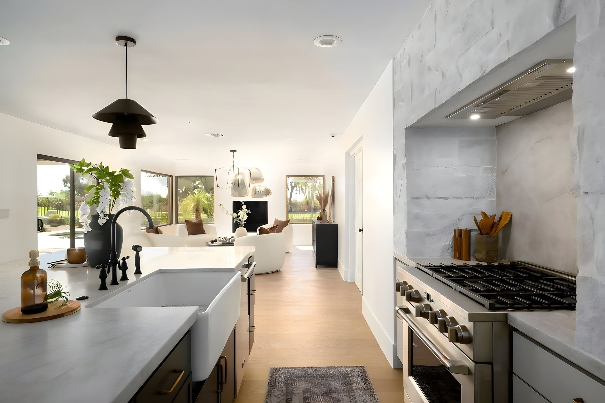 A professional-grade island kitchen designed for serious entertaining — with sightlines to Pinnacle Peak from every angle.