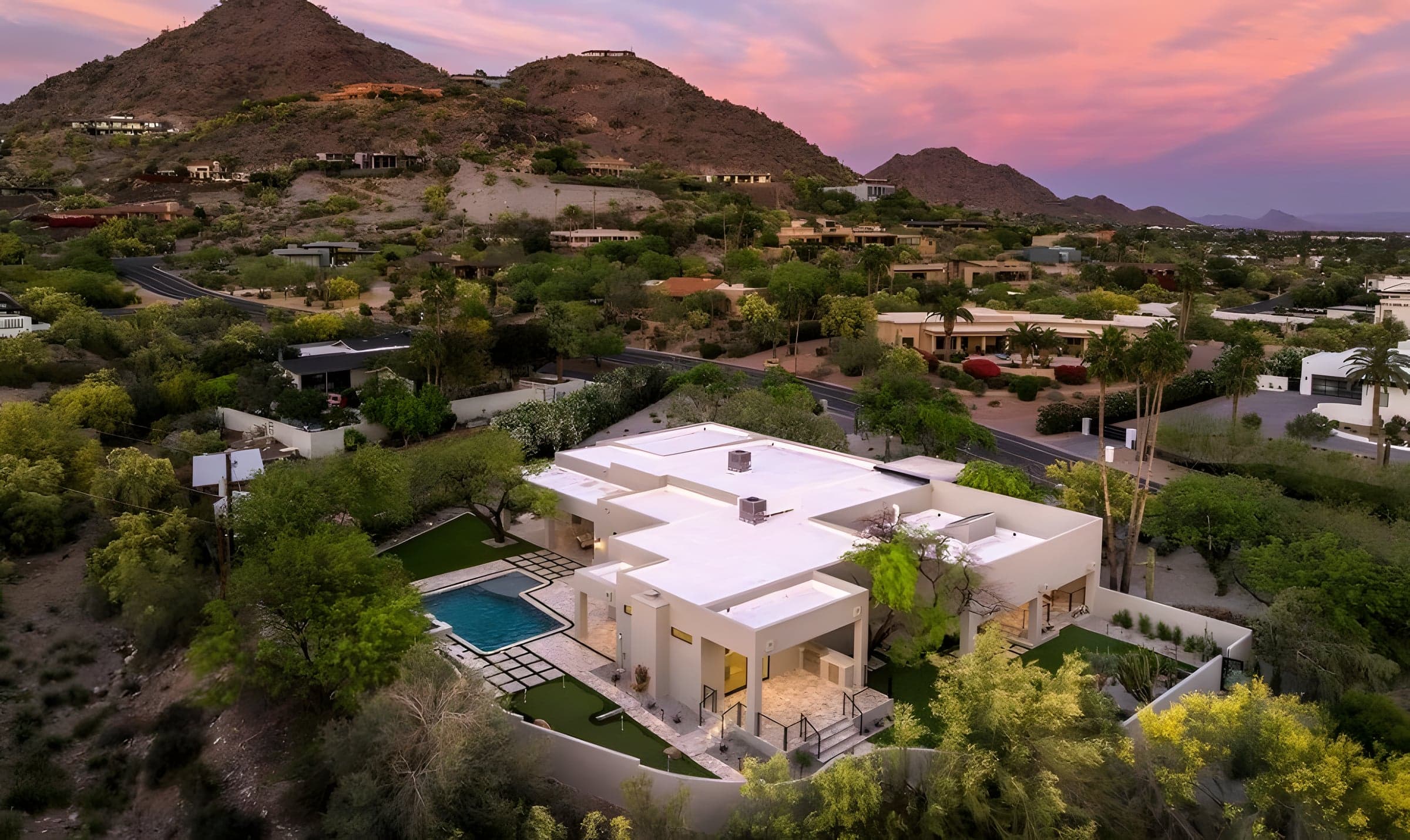 From above, the geometry of the architecture meets the geometry of the desert — a single composition.