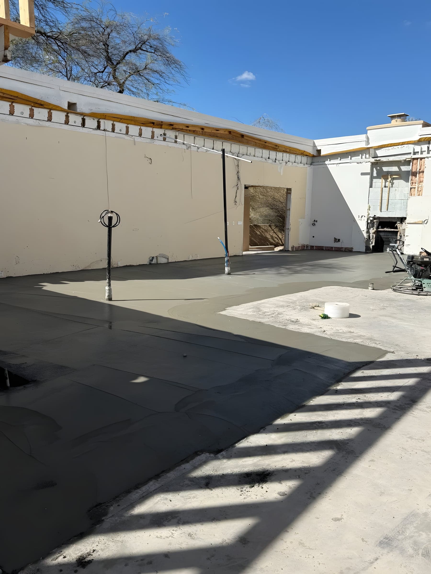 Concrete foundation and slab preparation showing rebar grid